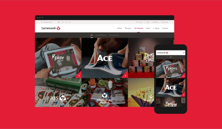 Cartamundi responsive website. Cartamundi's nieuwe website op computer en smartphone, responsive webdesign, responsive web development, online rebranding, huisstijl.